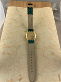 Vintage NOS Swatch Irony MID-SIZE YLG101 Sleeping Beauty Gold Tone Stainless Steel Quartz 1995 RARE!