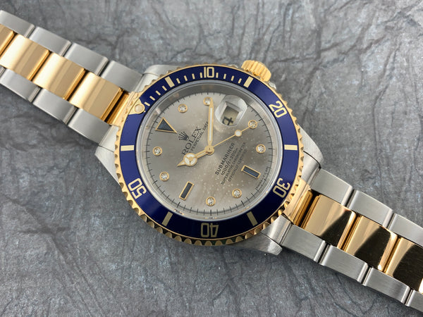 Rolex Oyster Perpetual Submariner Date Stainless Steel and 18K Gold with Rare Tropical Diamond/Sapphire Serti Dial 16613