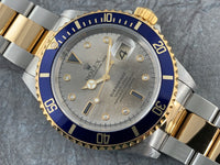 Rolex Oyster Perpetual Submariner Date Stainless Steel and 18K Gold with Rare Tropical Diamond/Sapphire Serti Dial 16613